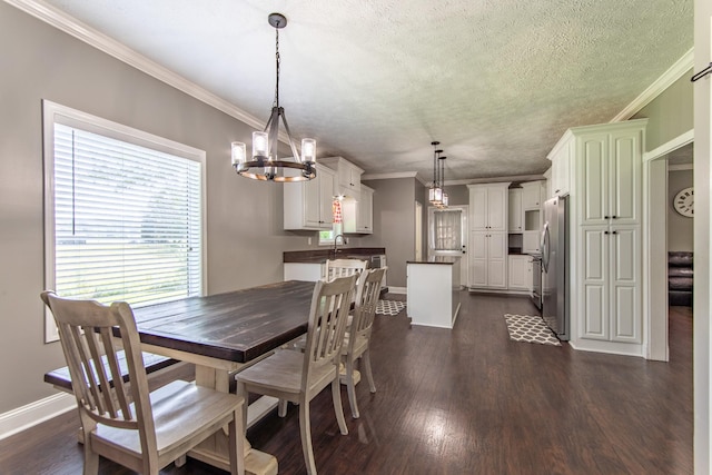 dining room featuring baseboards, an inviting chandelier, dark wood-style floors, and crown molding