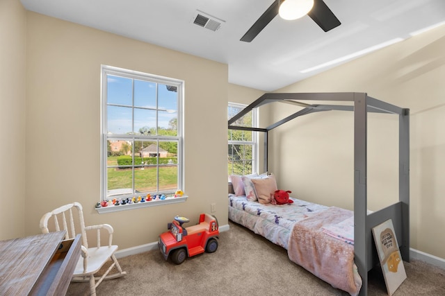 bedroom with baseboards, visible vents, carpet floors, and ceiling fan