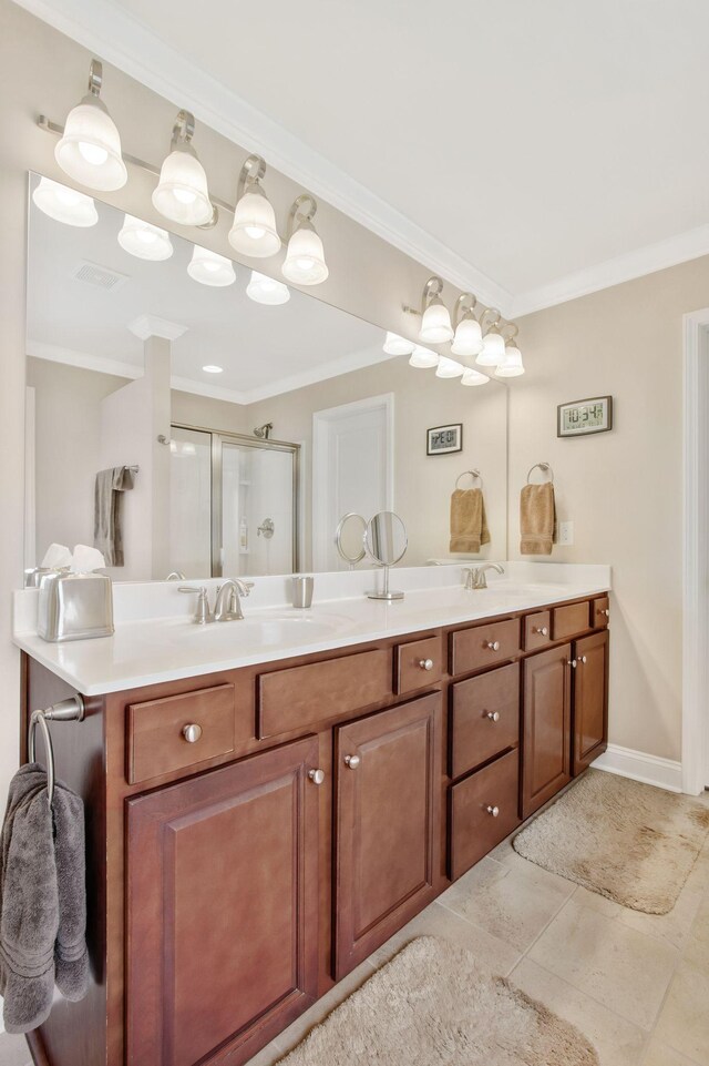 411 Valleyview Dr, Franklin, TN 37064 - full bathroom with tile patterned floors, a sink, double vanity, a stall shower, and crown molding