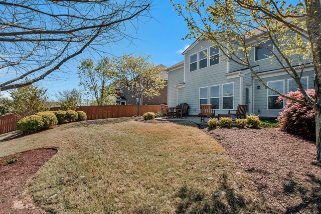 411 Valleyview Dr, Franklin, TN 37064 - rear view of house with a lawn, fence, and a patio area