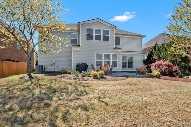 411 Valleyview Dr, Franklin, TN 37064 - rear view of property featuring central air condition unit, a lawn, a patio, and fence