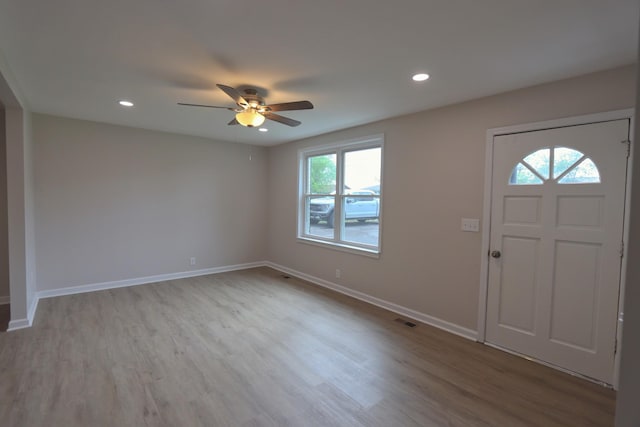 foyer entrance with baseboards, recessed lighting, wood finished floors, and ceiling fan
