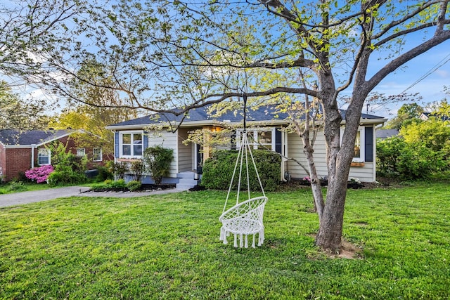 view of front of home with a front yard