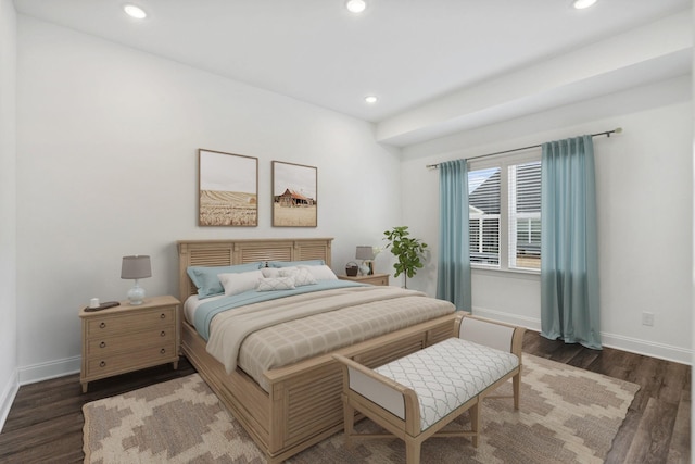 bedroom with baseboards, wood finished floors, and recessed lighting