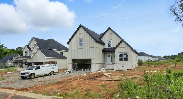 994 Alton Dr, Clarksville, TN 37043 - view of front of home with board and batten siding and a garage