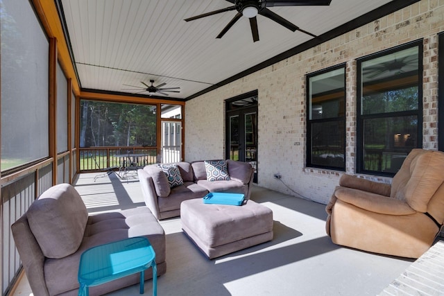 exterior space featuring outdoor lounge area and a ceiling fan