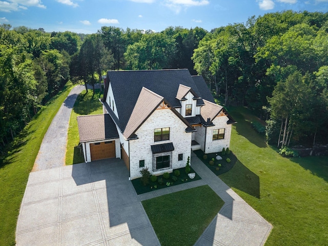 bird's eye view featuring a view of trees