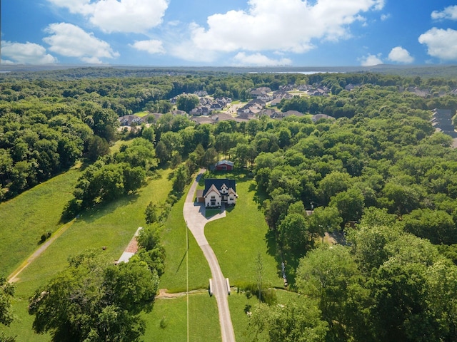 aerial view with a wooded view