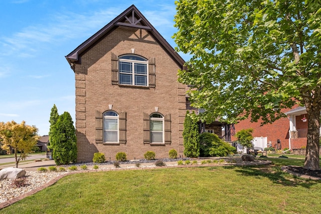 5000 Moretto Ct, Spring Hill, TN 37174 - view of front facade with brick siding and a front yard