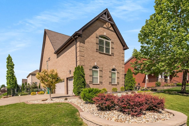 5000 Moretto Ct, Spring Hill, TN 37174 - view of property exterior featuring brick siding, a yard, and concrete driveway