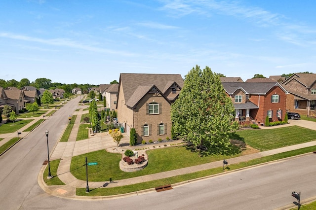 5000 Moretto Ct, Spring Hill, TN 37174 - view of front of home featuring a residential view, brick siding, and a front yard