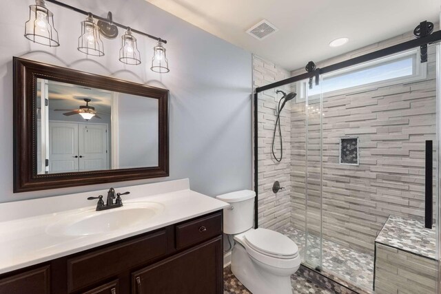 5000 Moretto Ct, Spring Hill, TN 37174 - bathroom with vanity, a stall shower, and ceiling fan