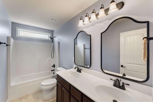 5000 Moretto Ct, Spring Hill, TN 37174 - full bathroom featuring double vanity, bathing tub / shower combination, and tile patterned floors
