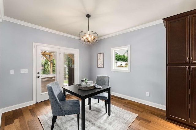 5000 Moretto Ct, Spring Hill, TN 37174 - dining area featuring crown molding, light wood-style flooring, and a chandelier