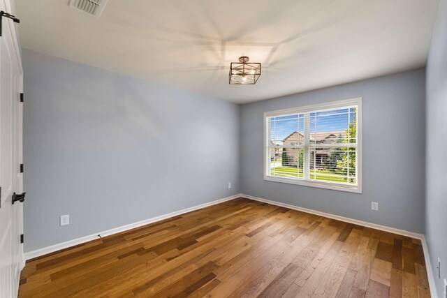 5000 Moretto Ct, Spring Hill, TN 37174 - unfurnished room with baseboards and wood-type flooring