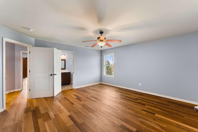 5000 Moretto Ct, Spring Hill, TN 37174 - unfurnished bedroom with hardwood / wood-style flooring, ceiling fan, and ensuite bathroom