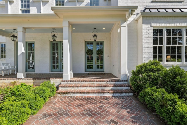 6124 Montcrest Dr, Nashville, TN 37215 - entrance to property featuring a porch, french doors, and brick siding