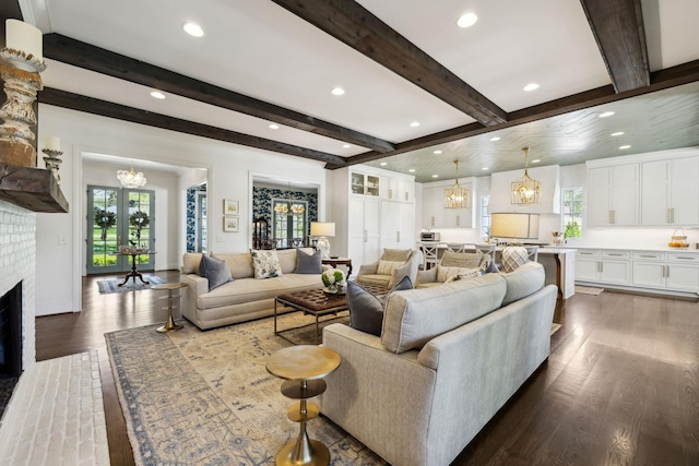 6124 Montcrest Dr, Nashville, TN 37215 - living room with beamed ceiling, dark wood-type flooring, recessed lighting, and a chandelier