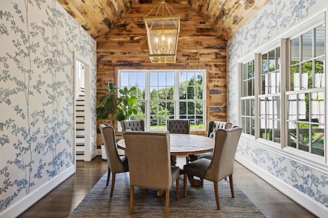 6124 Montcrest Dr, Nashville, TN 37215 - dining space featuring lofted ceiling, a notable chandelier, wallpapered walls, and baseboards