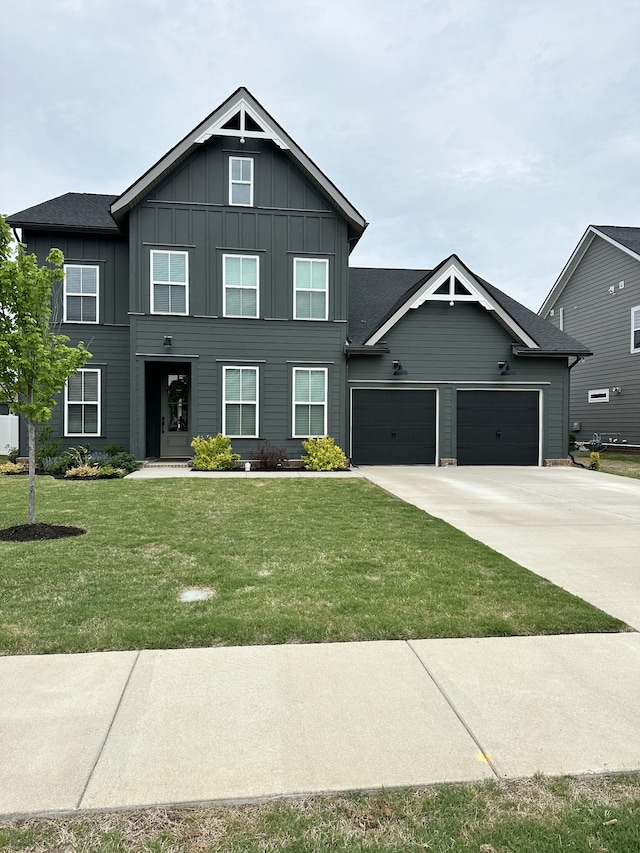 5516 Shelton Blvd, Murfreesboro, TN 37129 - view of front facade with board and batten siding, a front yard, concrete driveway, and an attached garage