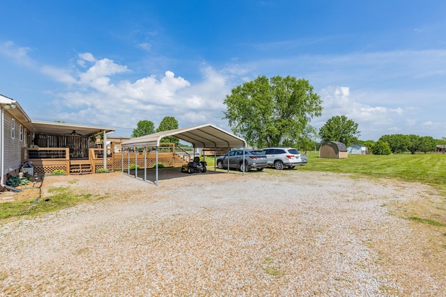 1496 Wade Brown Rd, Lewisburg, TN 37091 - view of vehicle parking featuring a carport and gravel driveway