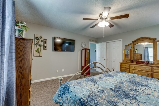 1496 Wade Brown Rd, Lewisburg, TN 37091 - bedroom featuring a closet, baseboards, ceiling fan, a textured ceiling, and carpet flooring
