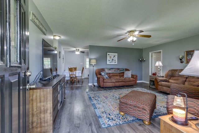 1496 Wade Brown Rd, Lewisburg, TN 37091 - living room featuring baseboards, a textured ceiling, ceiling fan, and wood finished floors