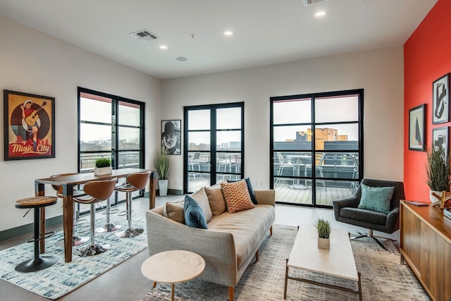 1900 12th Ave S Unit 219, Nashville, TN 37203 - living area with visible vents and recessed lighting