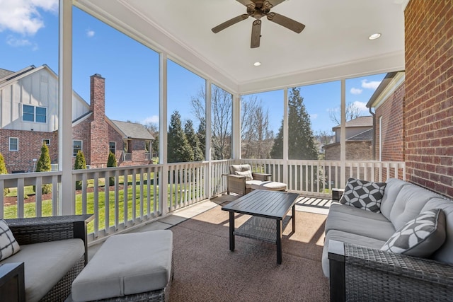 sunroom / solarium featuring an outdoor hangout area and a ceiling fan