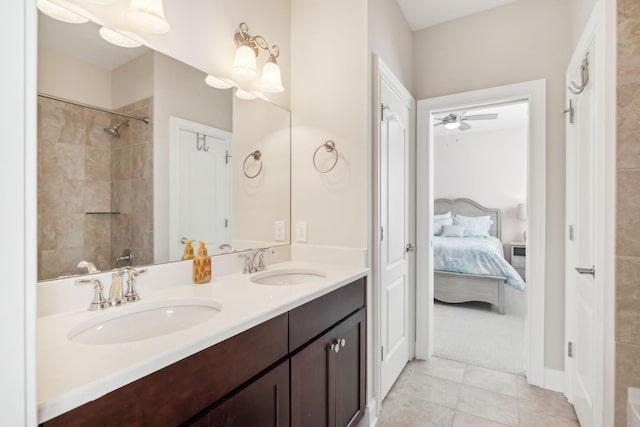 bathroom featuring ensuite bath, a ceiling fan, a sink, and double vanity