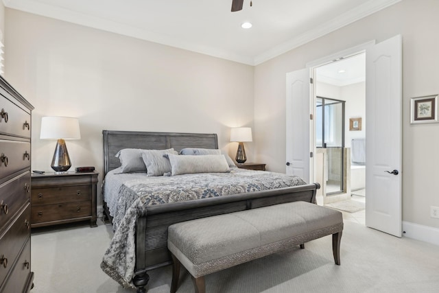 bedroom with ensuite bathroom, light colored carpet, baseboards, ornamental molding, and recessed lighting