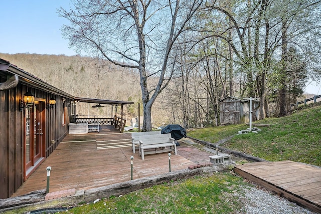 237 Cooper Ln, Smithville, TN 37166 - wooden deck with a yard and ceiling fan