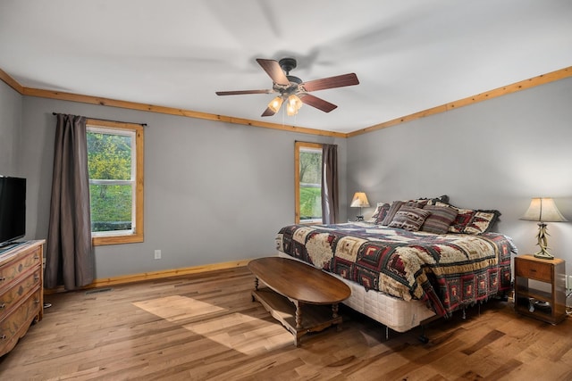 237 Cooper Ln, Smithville, TN 37166 - bedroom with wood finished floors, visible vents, a ceiling fan, and baseboards