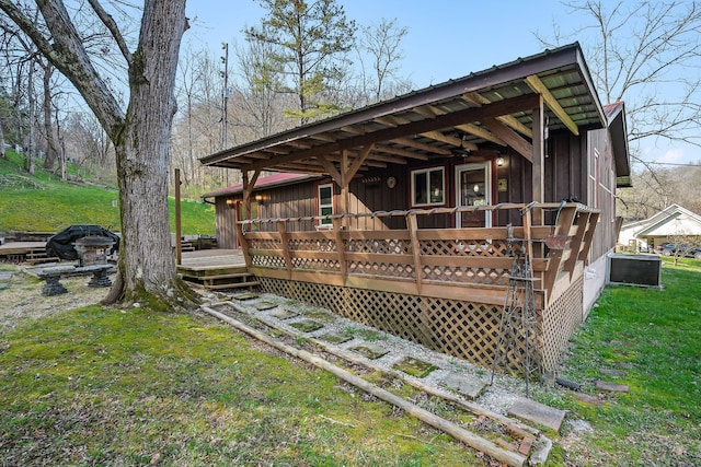 237 Cooper Ln, Smithville, TN 37166 - back of property featuring a yard, board and batten siding, and a deck