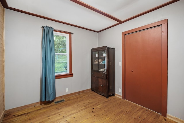 237 Cooper Ln, Smithville, TN 37166 - empty room with light wood-type flooring, visible vents, and ornamental molding