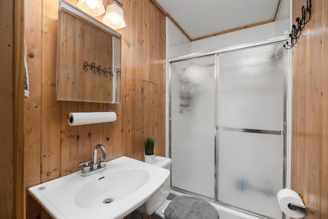 237 Cooper Ln, Smithville, TN 37166 - bathroom with an enclosed shower, a sink, and wooden walls