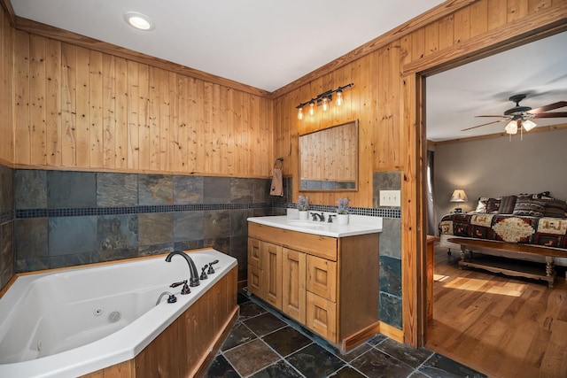 237 Cooper Ln, Smithville, TN 37166 - full bathroom featuring crown molding, wood walls, ceiling fan, a tub with jets, and vanity
