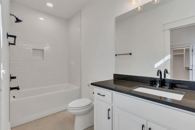bathroom featuring vanity, bathtub / shower combination, toilet, tile patterned flooring, and recessed lighting