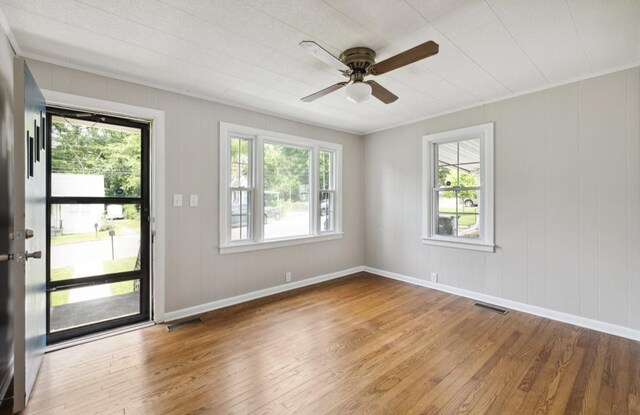 1901 Cherry St, Columbia, TN 38401 - spare room featuring wood finished floors, plenty of natural light, and baseboards