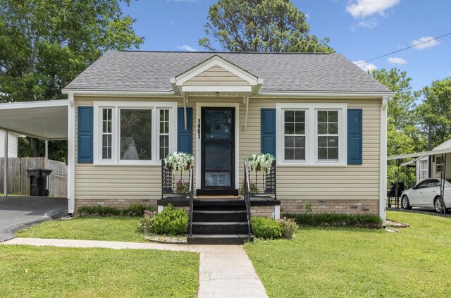 1901 Cherry St, Columbia, TN 38401 - bungalow featuring roof with shingles, an attached carport, and crawl space