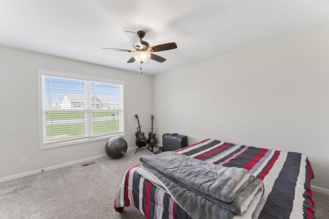 1132 Richland Farms Dr, Manchester, TN 37355 - carpeted bedroom featuring baseboards, visible vents, and ceiling fan