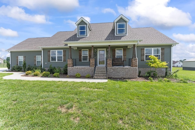 1132 Richland Farms Dr, Manchester, TN 37355 - view of front of home featuring a shingled roof, a porch, and a front yard