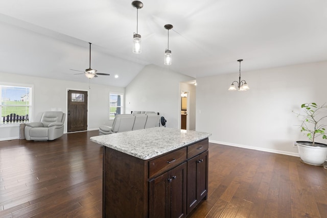 1132 Richland Farms Dr, Manchester, TN 37355 - kitchen with plenty of natural light, dark wood-style flooring, vaulted ceiling, and hanging light fixtures