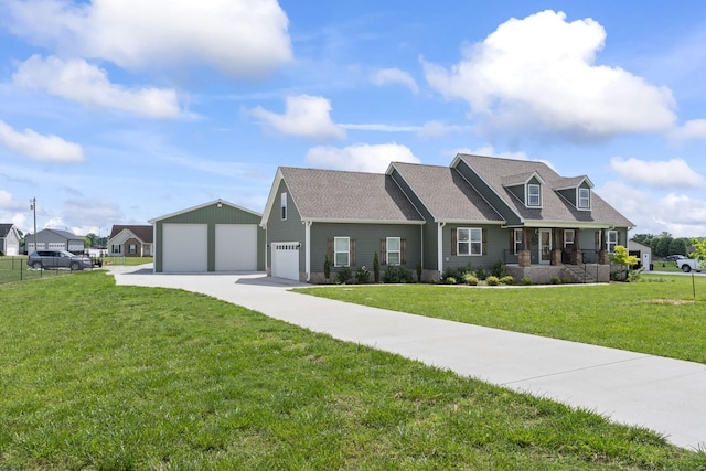 1132 Richland Farms Dr, Manchester, TN 37355 - new england style home with a detached garage, a shingled roof, and a front lawn