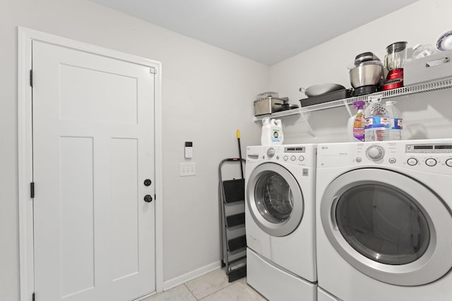 1132 Richland Farms Dr, Manchester, TN 37355 - laundry area featuring laundry area, washer and clothes dryer, baseboards, and light tile patterned floors