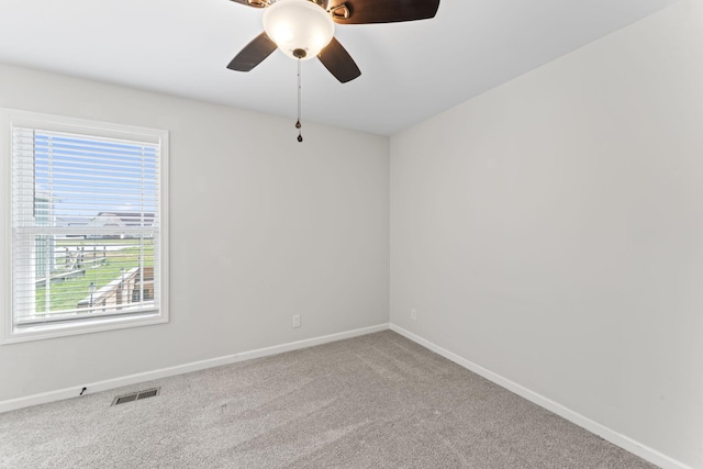 1132 Richland Farms Dr, Manchester, TN 37355 - unfurnished room with visible vents, a ceiling fan, baseboards, and carpet
