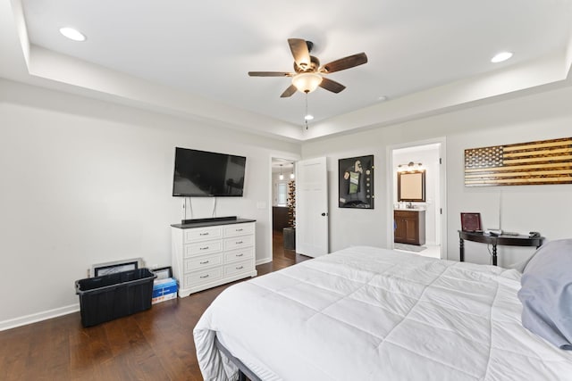 1132 Richland Farms Dr, Manchester, TN 37355 - bedroom with recessed lighting, a raised ceiling, baseboards, and dark wood-style floors