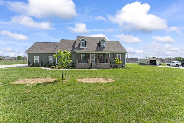 1132 Richland Farms Dr, Manchester, TN 37355 - cape cod home with a porch and a front lawn