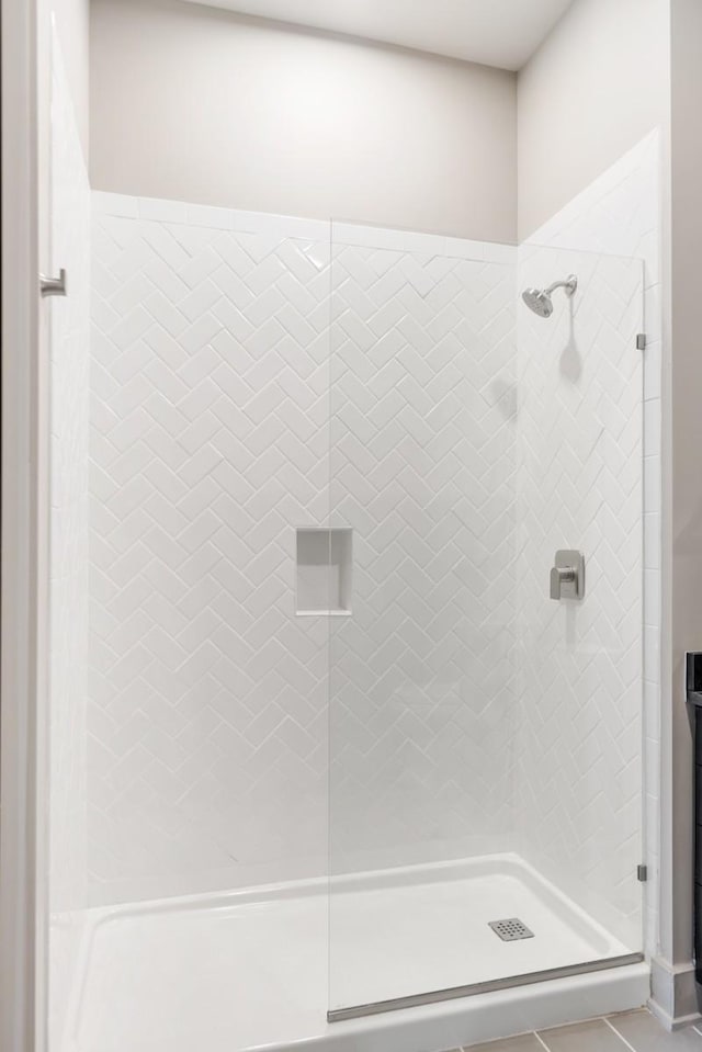 full bathroom with a shower stall