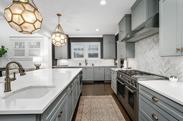 2510 Belmont Blvd, Nashville, TN 37212 - kitchen featuring wall chimney range hood, a sink, double oven range, light countertops, and gray cabinetry